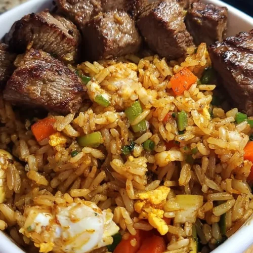 Delicious Hibachi Fried Rice with chicken and steak on a plate