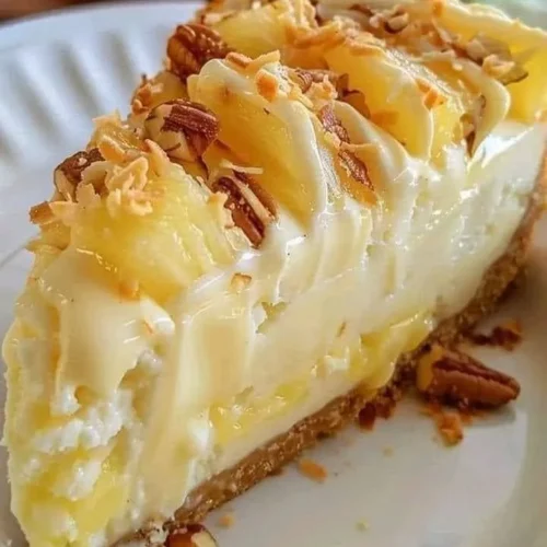Delicious Pineapple Cream Cheesecake with a creamy texture and tropical flavor.