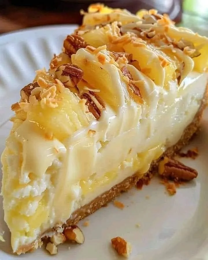Delicious Pineapple Cream Cheesecake with a creamy texture and tropical flavor.