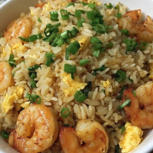 Delicious shrimp fried rice with scrambled egg served in a bowl
